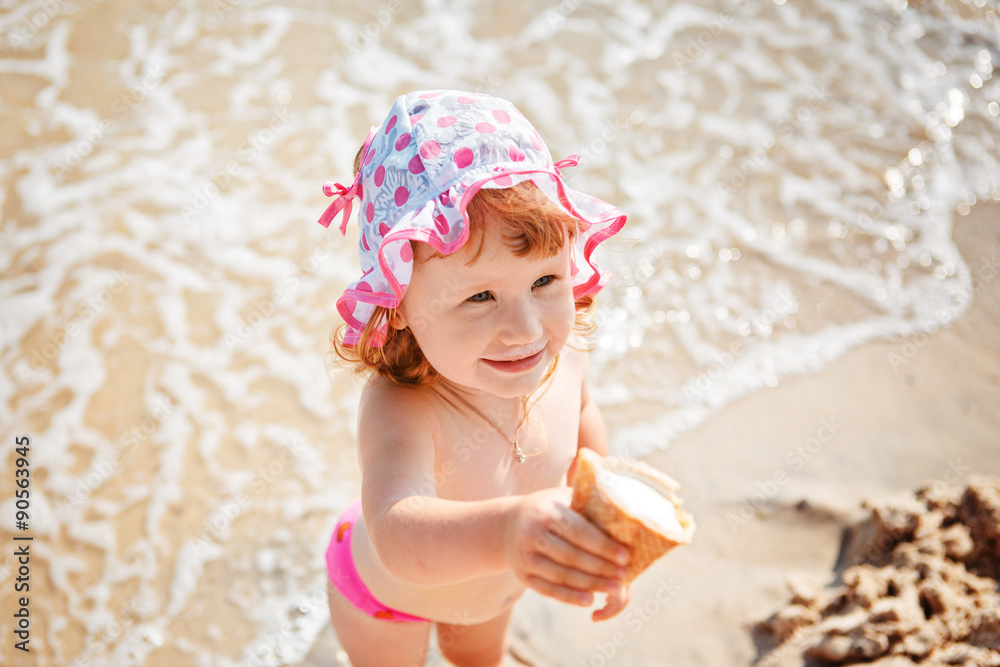 little girl eating ice cream on beach vacation Stock Photo | Adobe Stock