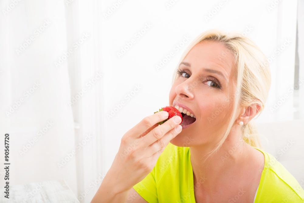 Mature woman enjoying a smoothie Mature woman enjoying a smoothie