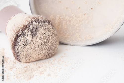 macro shot of makeup powder on brush,close up makeup powder on brush