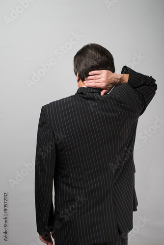 businessman standing with his back