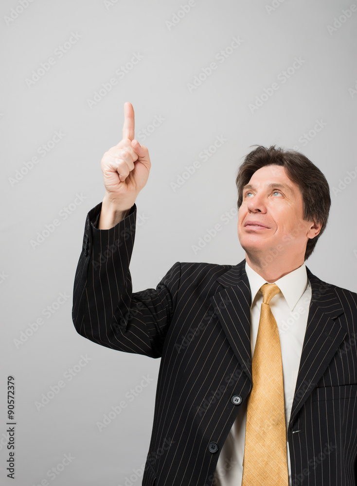 man shows his index finger up man shows his index finger up