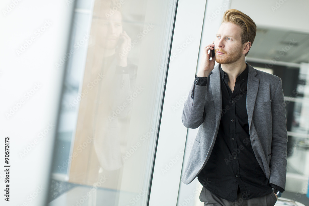 Young man with mobile phone Young man with mobile phone