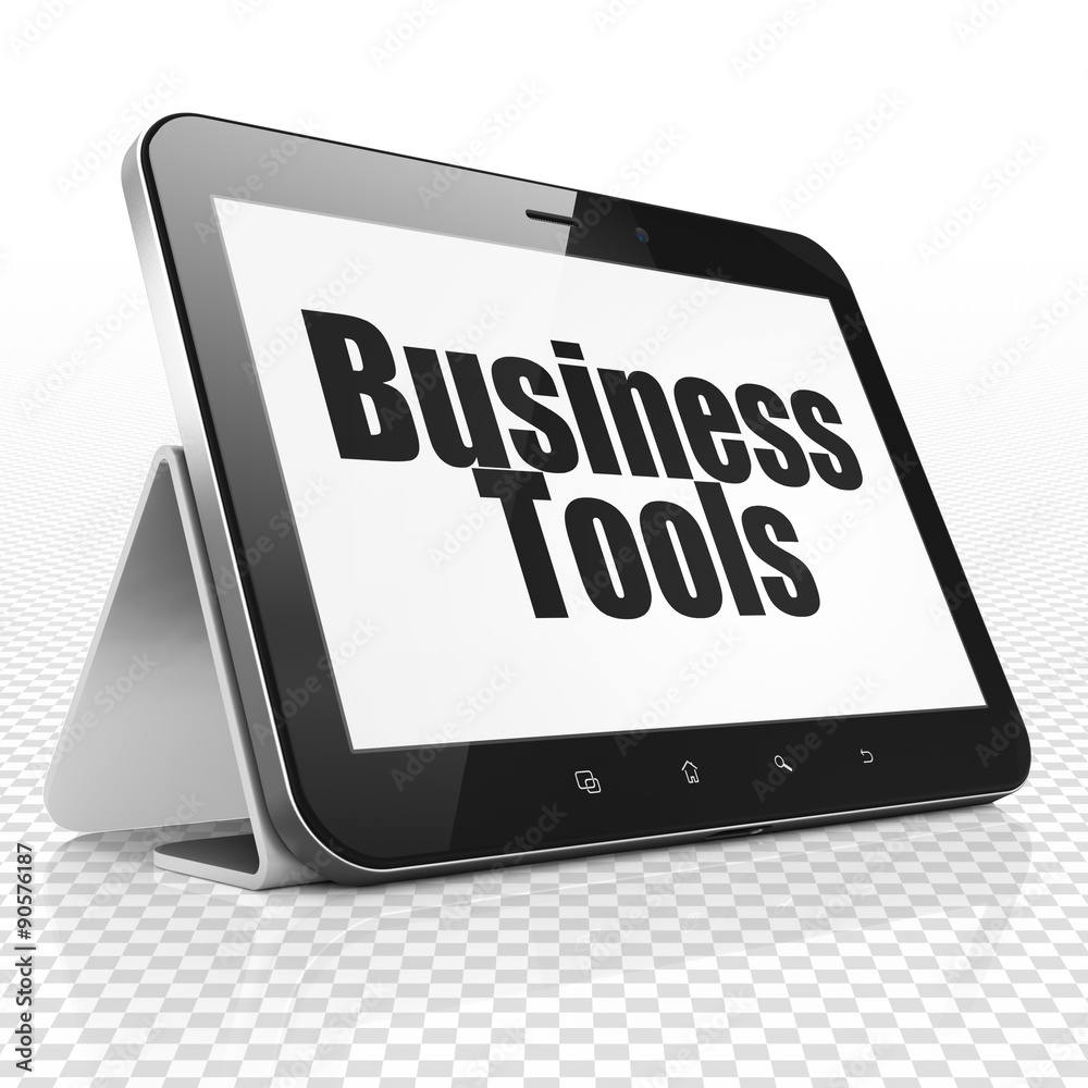 Business concept: Tablet Computer with Business Tools on display Business concept: Tablet Computer with Business Tools on display