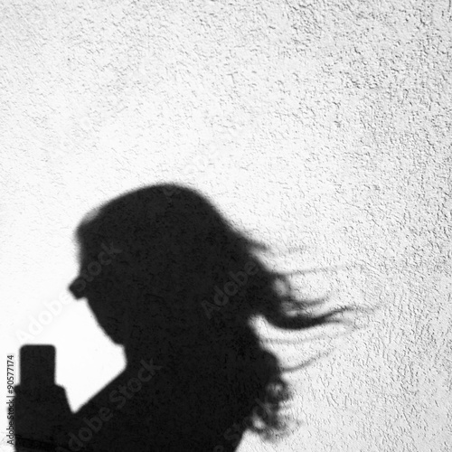 Selfie of the shadow of a young woman