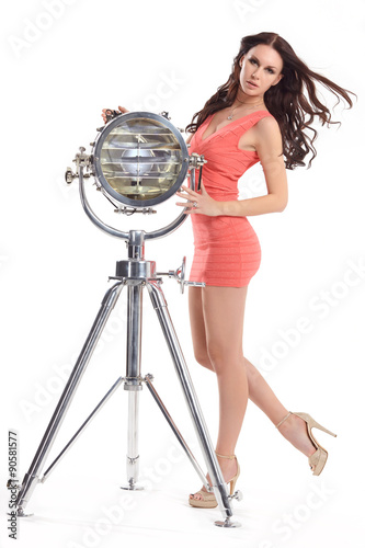 Beautiful girl in a short dress isolated on white