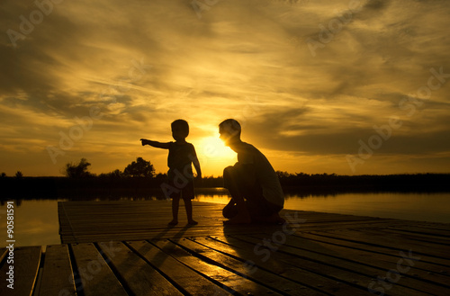 Family sunset on the lake