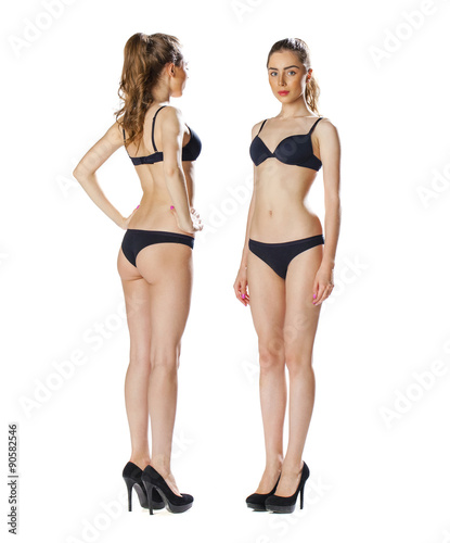 Portrait in full growth, two beautiful models in black lingerie,