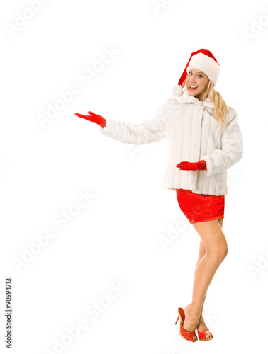 Sexy Girl dressed as Santa Claus Points Finger to Copy Spaces