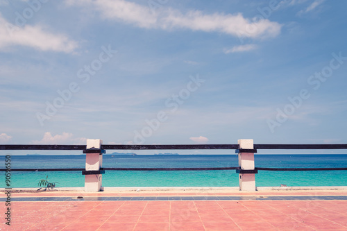 balcony with blue sky and sea - soft focus with film filter