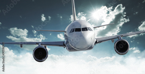 Airplane above the clouds