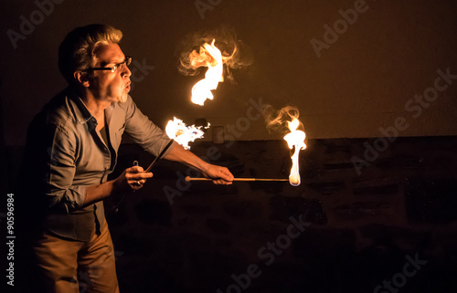 Man Blows Fire into the Night