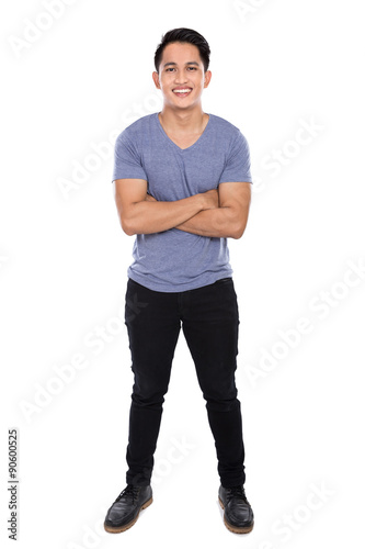 Young asian man posing on the white background, crossed arms © Odua Images