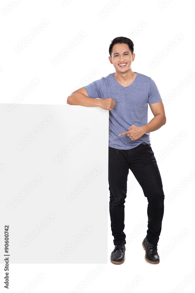 young asian man holding a blank banner