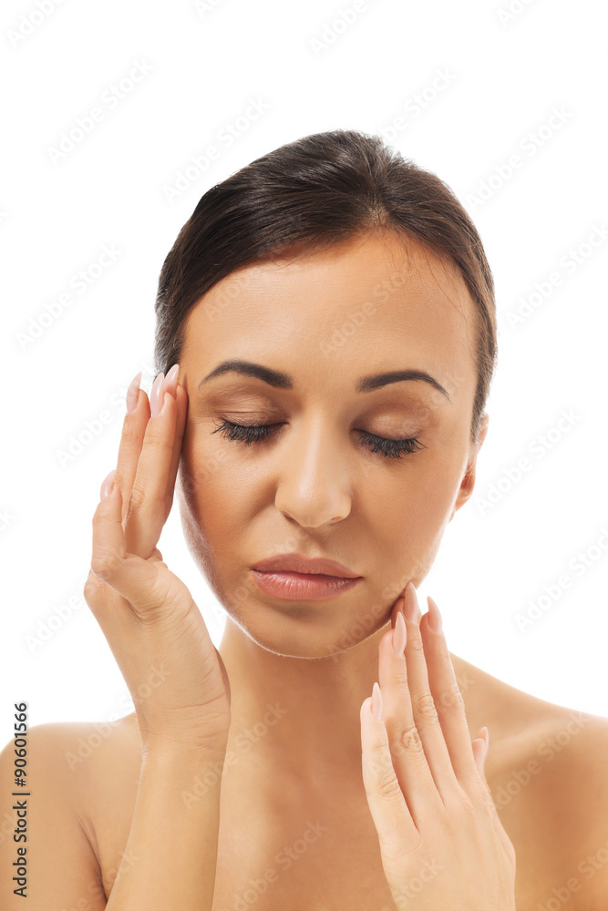 Spa woman touching her face Spa woman touching her face