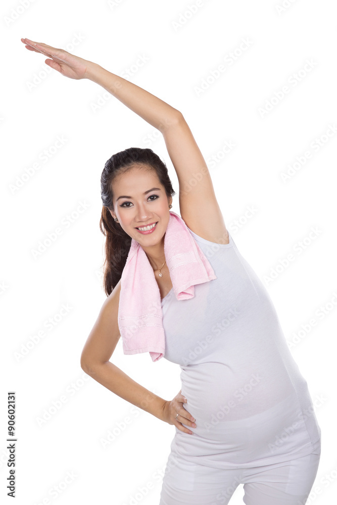 Beautiful asian pregnant woman exersicing, isolated Beautiful asian pregnant woman exersicing, isolated