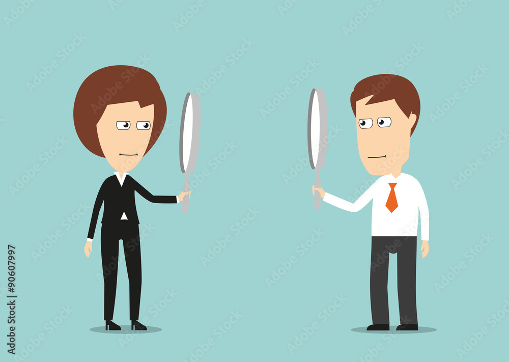 Colleagues observing each other through magnifiers Colleagues observing each other through magnifiers