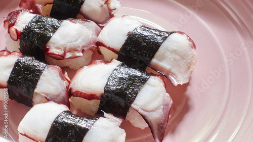 Tako sushi on  pink dish