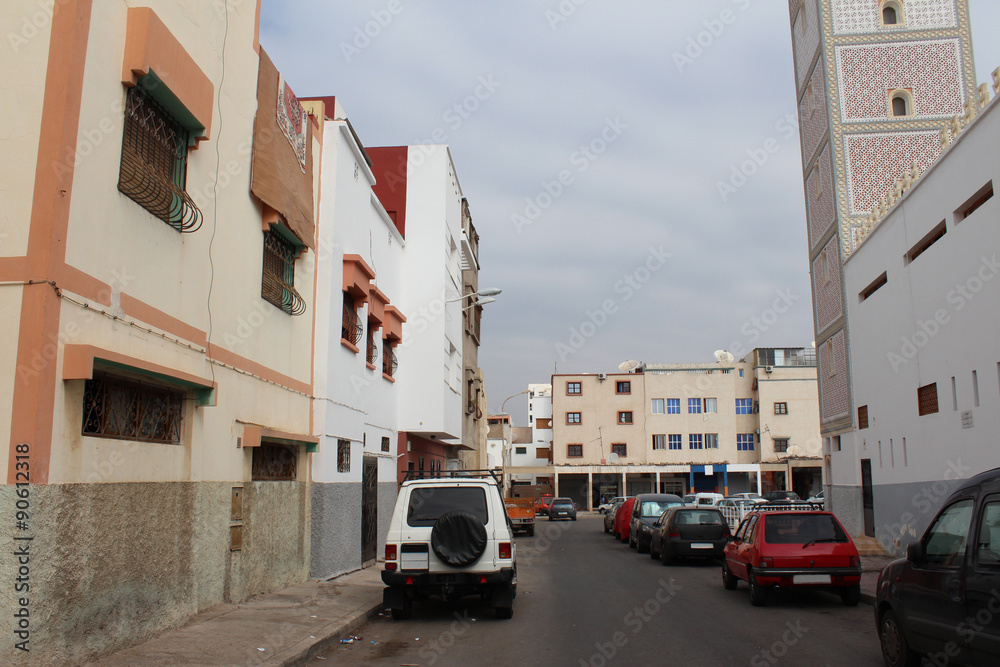 Arabian street with the parking cars on the road, Agadir, Morocco.
