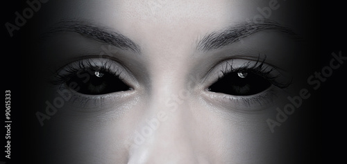 Valokuva Halloween concept, close up of evil female eyes