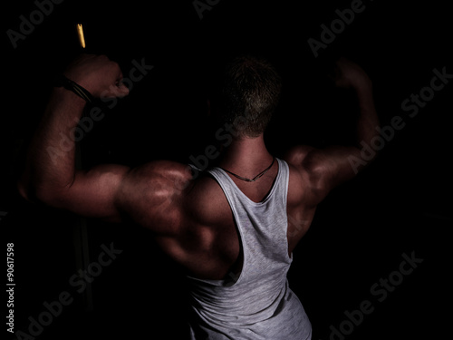 Fotografie, Obraz Portrait of a young bodybuilder in a gym