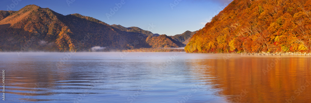 Lake Chuzenji, Japan at sunrise in autumn