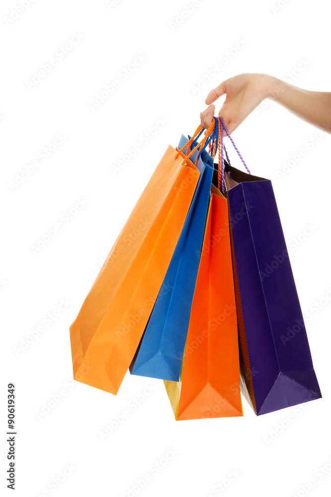 Woman hand with shopping bags.