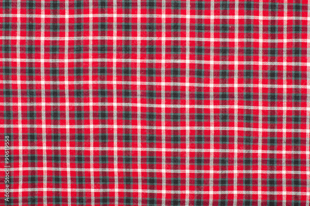 Scottish tartan pattern. Red and black plaid print as background. Symmetric square pattern. Scottish tartan pattern. Red and black plaid print as background. Symmetric square pattern.