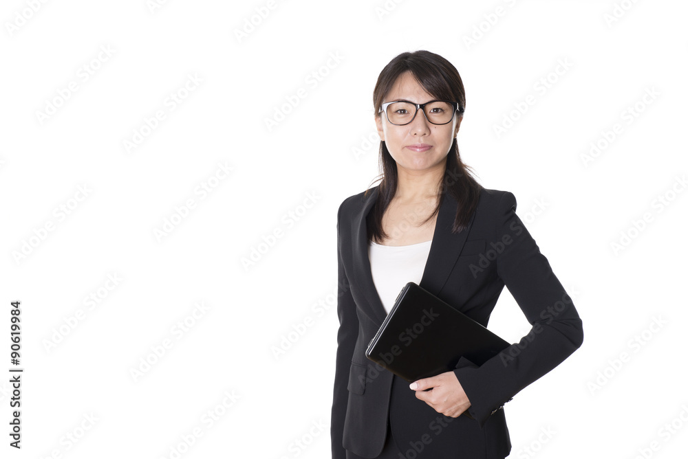 ノートパソコン持って立っている日本人のビジネスウーマン ノートパソコン持って立っている日本人のビジネスウーマン