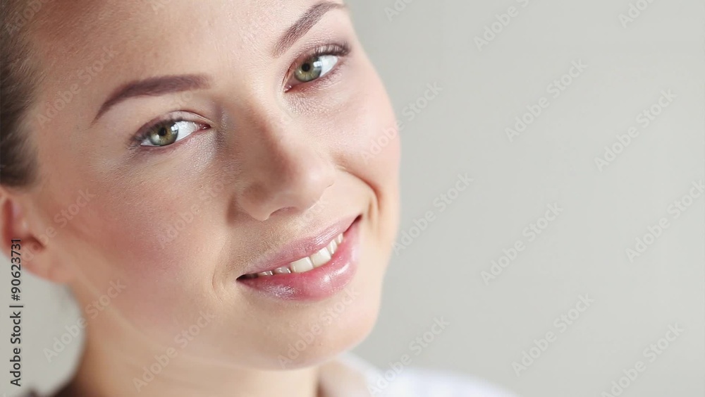 Stock close-up portrait of young student girl with everyday nude make-up with nice smile and happy  | Adobe Stock