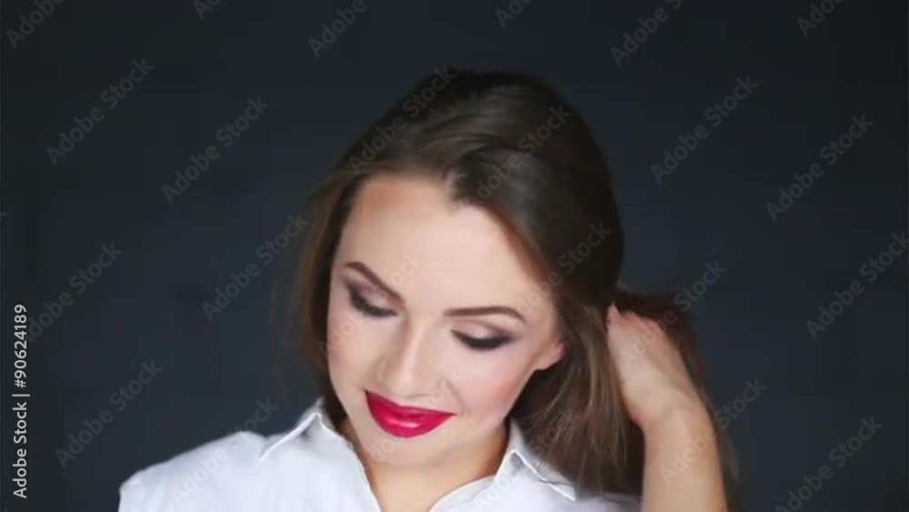 close-up business young woman with smoky eyes make-up with nice smile and laugh