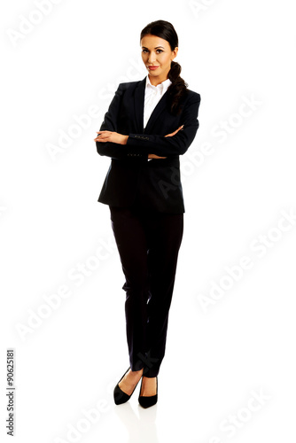 Businesswoman standing with folded arms