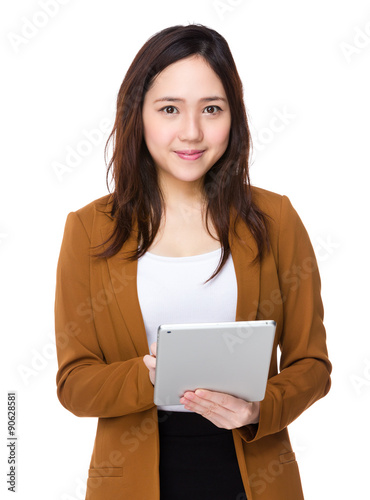 Asian Young businesswoman use of the tablet pc