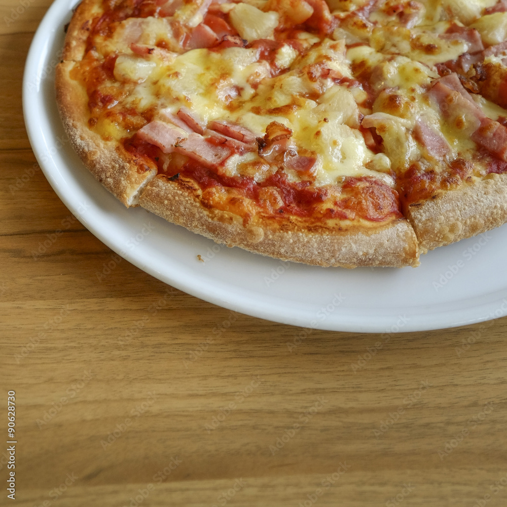 delicious hawaiian rustic style pizza made with fresh pineapples