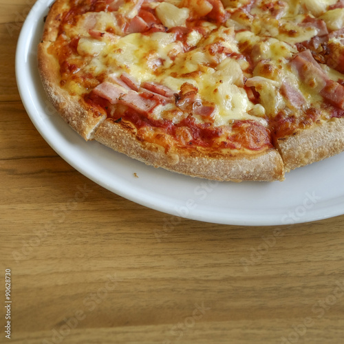 delicious hawaiian rustic style pizza made with fresh pineapples