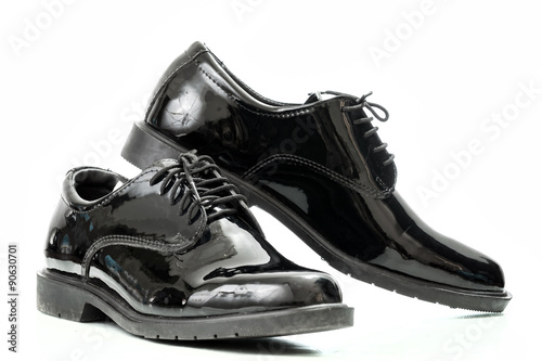 Black patent leather men shoes army isolated on white backgroun