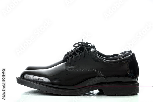 Black patent leather men shoes army isolated on white backgroun