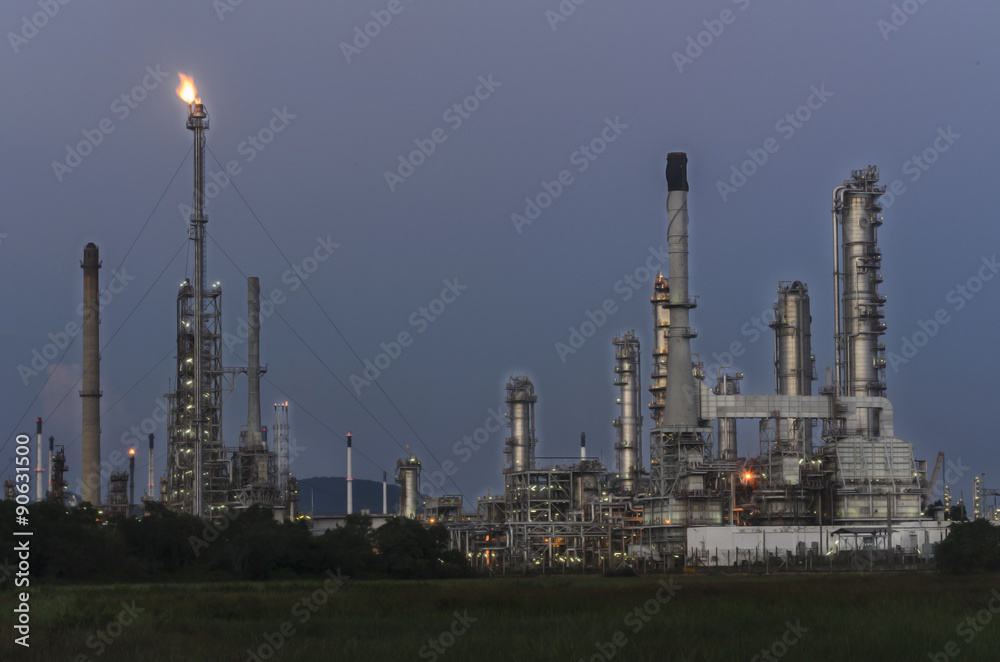 Oil refinery at evening