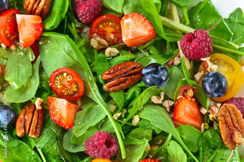 vegan salad with berries and nuts