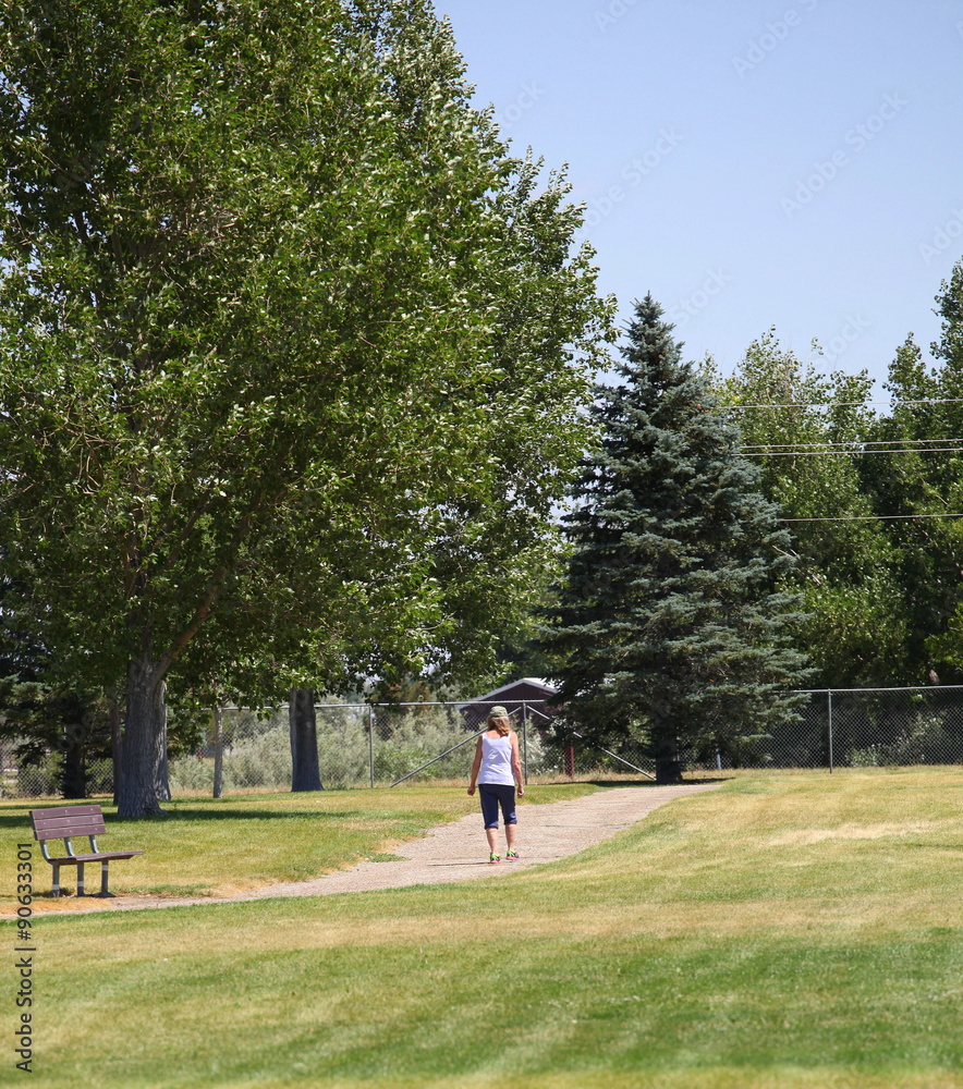 Mature female taking her morning walk outside. Mature female taking her morning walk outside.