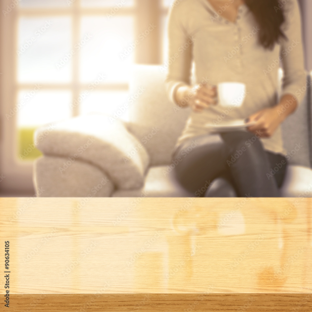 woman on sofa and cup of tea woman on sofa and cup of tea