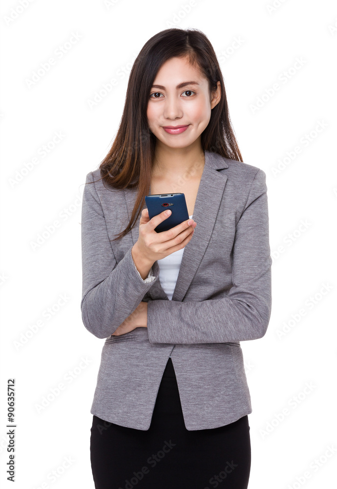 Asian young businesswoman use of the mobile phone Asian young businesswoman use of the mobile phone