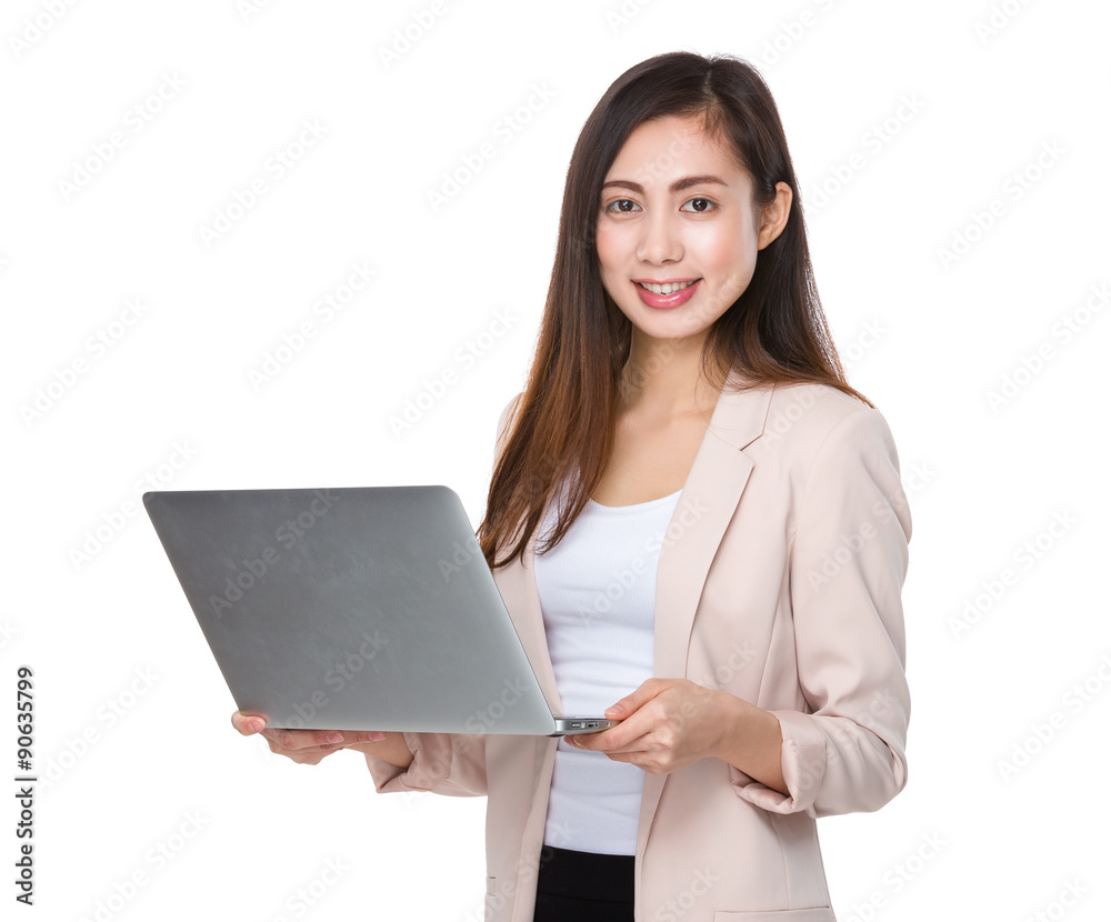 Young businesswoman use of the notebook computer Young businesswoman use of the notebook computer