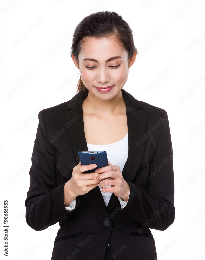 Asian businesswoman read on the cellphone Asian businesswoman read on the cellphone