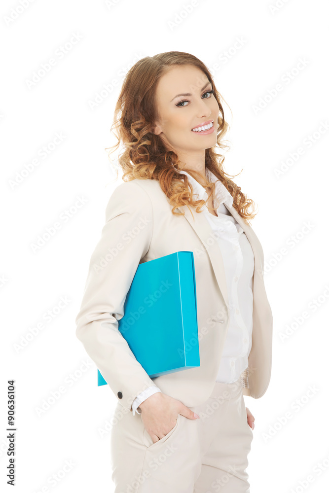 Happy businesswoman with binder. Happy businesswoman with binder.