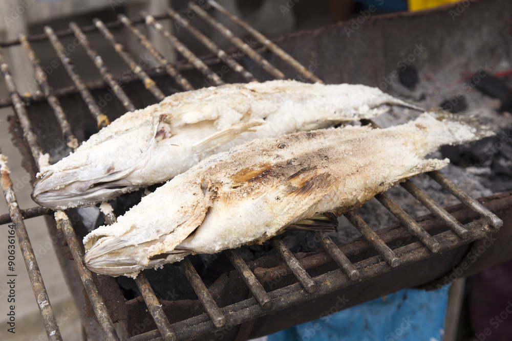 Grilled Seabass fish coated rock salt -
