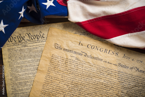 United States founding documents on a vintage American flag photo