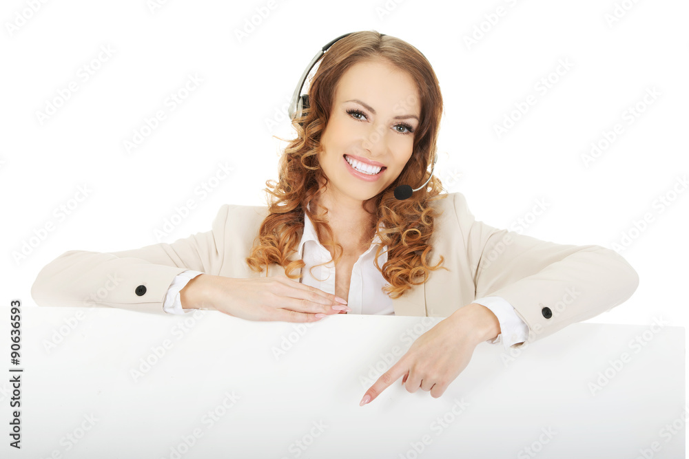 Call center woman pointing on empty banner. Call center woman pointing on empty banner.