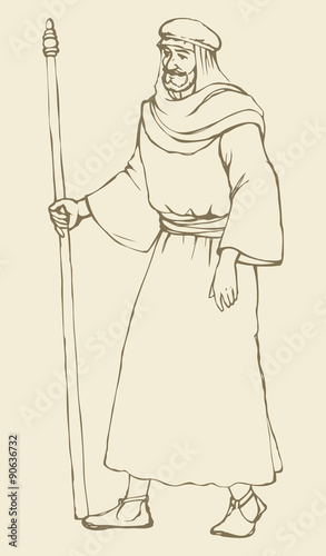 Man in ancient biblical clothes with stick
