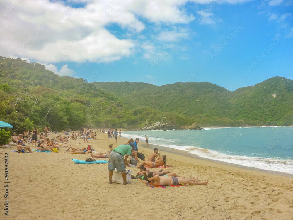 People at Tropical Beach of Tayrona National Park People at Tropical Beach of Tayrona National Park