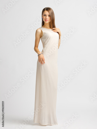 Young woman in long dress